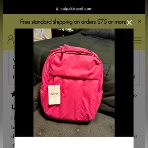 In search of a pink luka calpak 15in backpack!